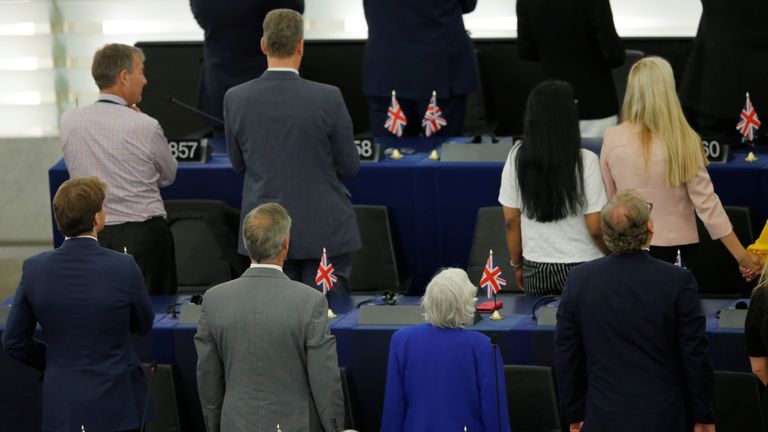 Members of the Brexit Party turn their back to the assembly as the European anthem is played during the first plenary session of the newly elected European Parliament in Strasbourg