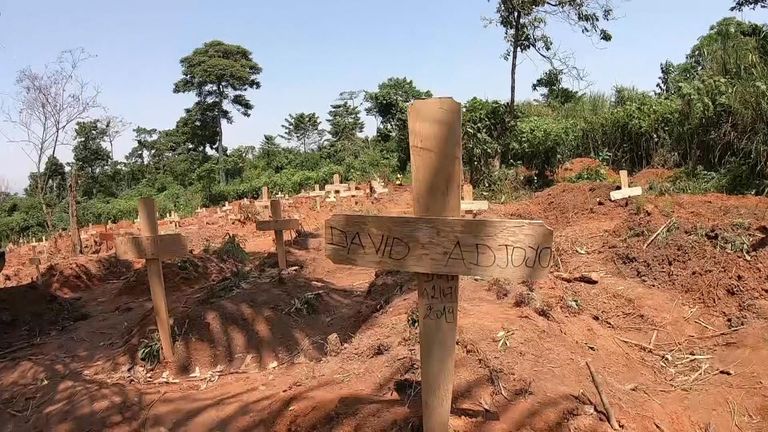 An ad-hoc burial site for Ebola victims has been set up in a forest 