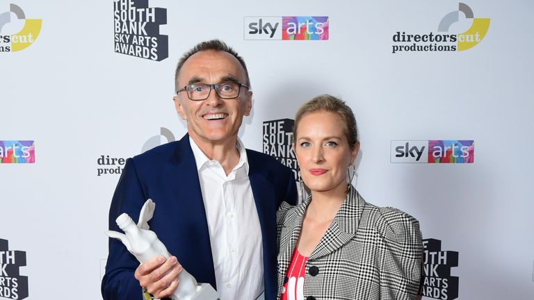 Danny Boyle with the Visual Art Award , presented by Polly Morgan, at the South Bank Sky Arts Awards at the Savoy Hotel in London. PRESS ASSOCIATION Photo. Picture date: Sunday July 7, 2019. See PA story SHOWBIZ Arts. Photo credit should read: Ian West/PA Wire 
