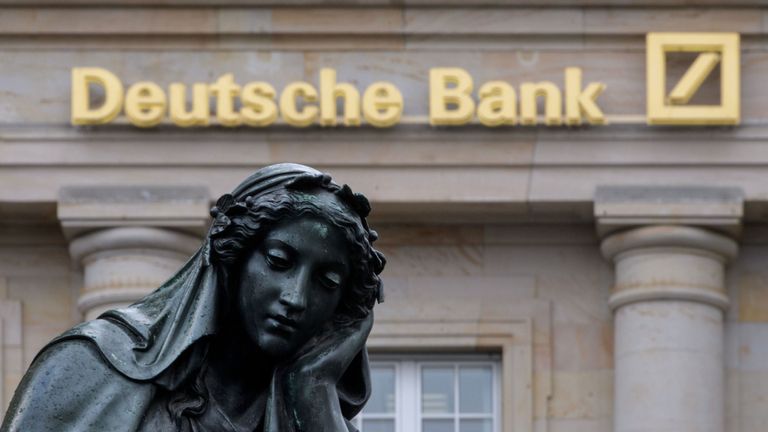 FRANKFURT AM MAIN, GERMANY - FEBRUARY 01: A branch of the German bank Deutsche Bank pictured with a sculpture of the &#39;Gutenberg&#39; monument on February 1, 2018 in Frankfurt, Germany. Deutsche Bank will announce financial results for 2017 tomorrow. CEO John Cryan has reportedly said the bank had its third straight year of losses but that it will continue on the restructuring course he is leading. (Photo by Thomas Lohnes/Getty Images)
