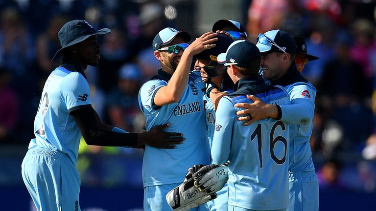 Then England players celebrate after their 119-run win