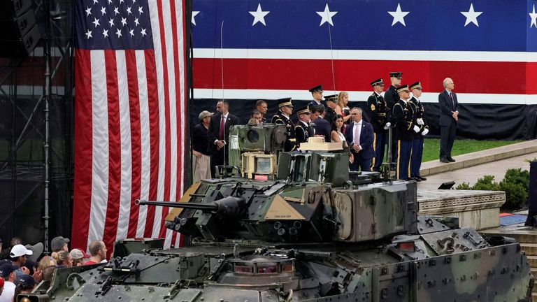 Spectators stand next to a tank at the Salute to America event at the Lincoln Memorial during Fourth of July Independence Day celebrations in Washington, D.C