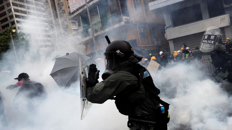 Hong Kong police fires tear gas at protesting activists 