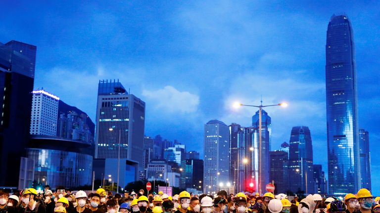 demonstration near a flag raising ceremony for the anniversary of Hong Kong handover to China in Hong Kong, China July 1, 2019. REUTERS/Tyrone Siu