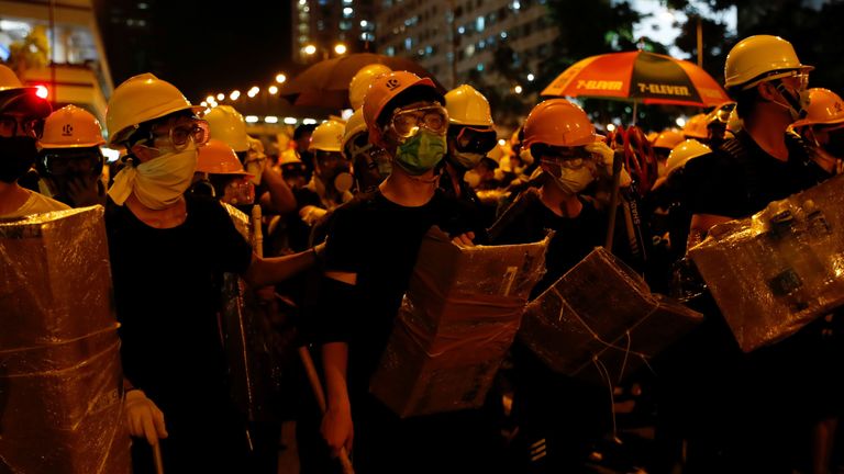 Protesters covered their faces with surgical masks 