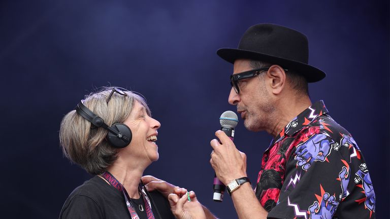 Actor Jeff Goldblum jokes around with a stage technician ahead of his performance with the Mildred Snitzer Orchestra at the West Holts Stage during the fifth day of the Glastonbury Festival at Worthy Farm in Somerset. PRESS ASSOCIATION Photo. Picture date: Sunday June 30, 2019. See PA story SHOWBIZ Glastonbury. Photo credit should read: Yui Mok/PA Wire