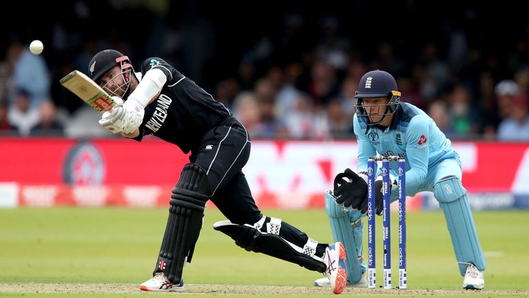 New Zealand's Kane Williamson (left) in batting action as England's wicketkeeper Jos Buttler looks on