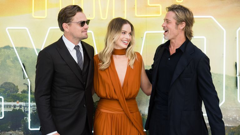 Leonardo DiCaprio, Margot Robbie and Brad Pitt attend the 