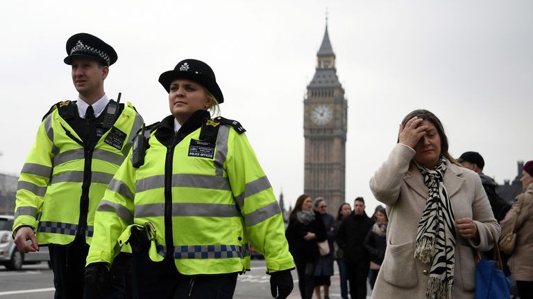 LONDON, ENGLAND - MARCH 24: Police officers patrol on Westminster Bridge on March 24, 2017 in London, England. A fourth person has died after Khalid Masood drove a car into pedestrians on Westminster Bridge before going on to fatally stab PC Keith Palmer on March 22. (Photo by Carl Court/Getty Images)
