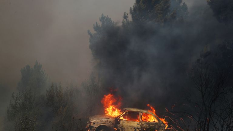 A car burns near at the small village of Vila de Rei, Portugal 