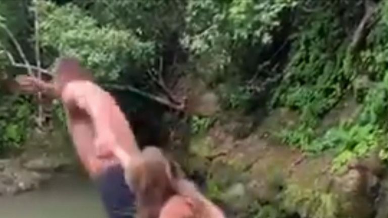 New England Patriots quarterback Tom Brady dives of cliff with daughter