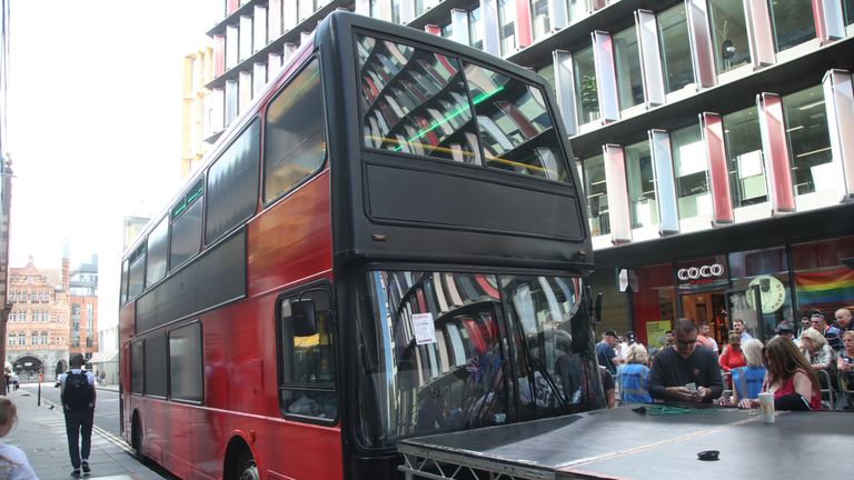 A double-decker bus screening pro-Tommy Robinson films parked in Old Bailey, which was issued with a Penalty Charge Notice as Robinson appeared the Old Bailey in London for a committal hearing for alleged contempt of court