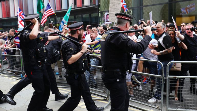 Supporters of Tommy Robinson clash with police outside the Old Bailey in London after the former EDL leader was found in contempt of court by High Court judges for filming defendants in a criminal trial and broadcasting the footage on social media. PRESS ASSOCIATION Photo. Picture date: Friday July 5, 2019. 