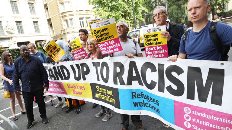 Stand Up To Racism demonstrators outside the Old Bailey in London