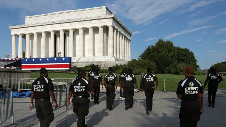 Event workers arrive at the Lincoln Memorial ahead of Thursday's July Fourth Salute to America celebration, on July 3, 2019 in Washington, DC. President Trump will deliver a speech at the memorial with military hardware on display including tanks, and flyovers by military aircraft