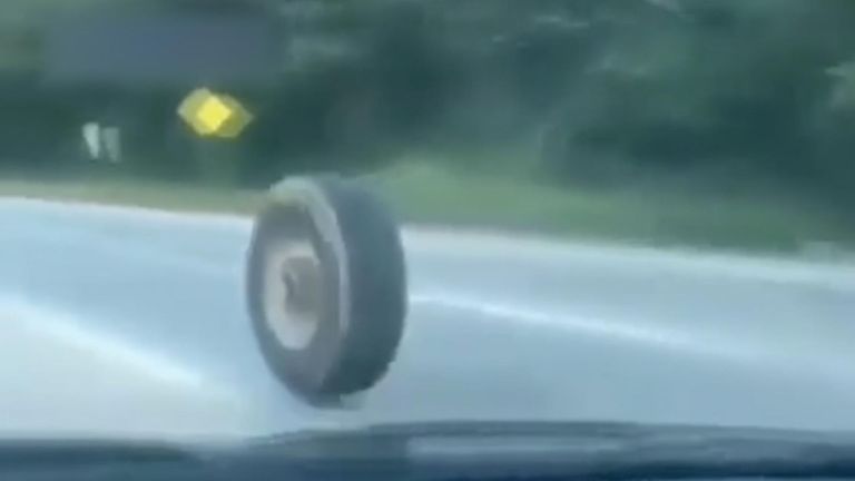 Tyre rolls along US highway, bounces on to oncoming traffic and crashes into moving car