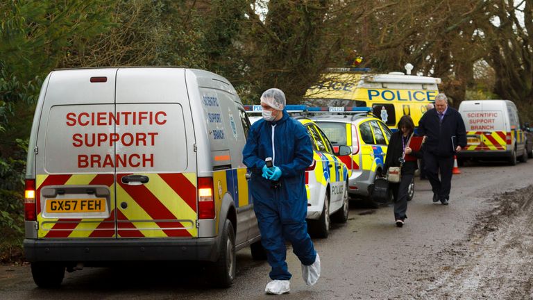 Police forensics officers arriving at the house where Valerie Graves was found dead