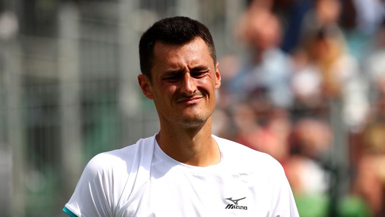 Bernard Tomic of Australia reacts in his men&#39;s singles first round match against Jo-Wilfred Tsonga of France on Tuesday