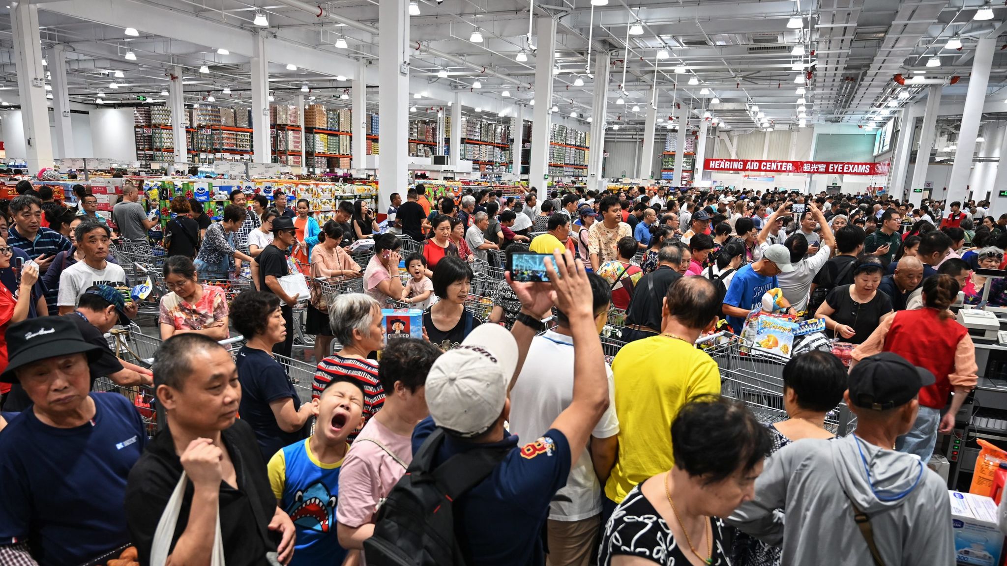 Costco forced to close first store in China as shoppers jostle over ...