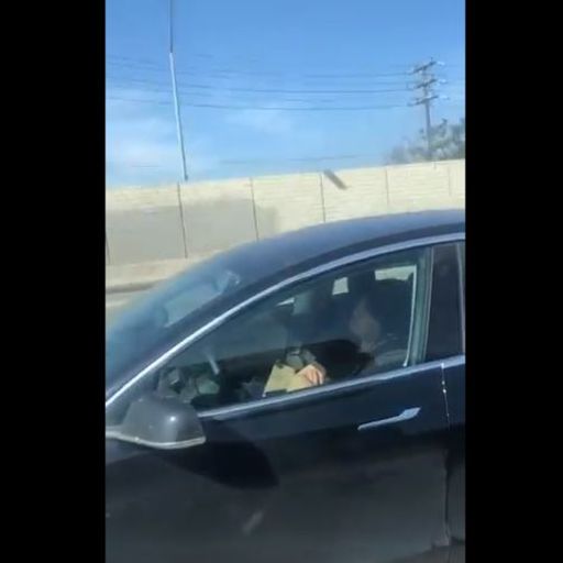 Tesla driver caught on video 'sleeping' while car is on auto-pilot