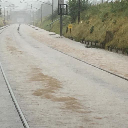 Floods shut West Coast Main Line between Scotland and England