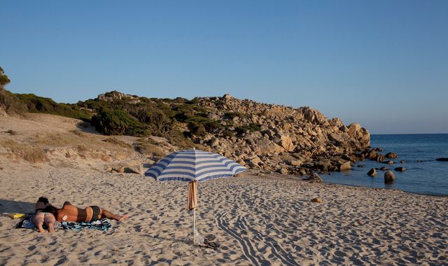 Sardinia: Tourists who took sand from beach face jail sentence