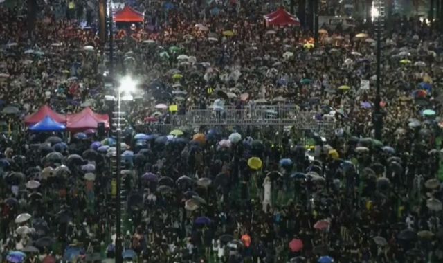 Protesters in Hong Kong rally chant on the streets - but demonstration remains peaceful
