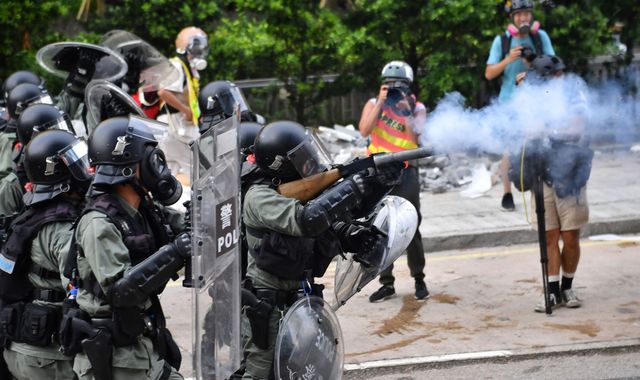 Hong Kong police fire tear gas in new protests over surveillance fears