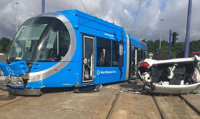 Wolverhampton tram collision: Five injured as car overturns in city centre