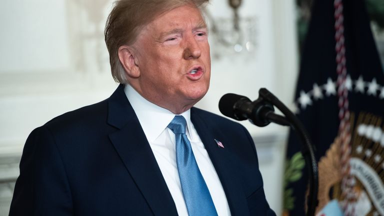 US President Donald Trump speaks about the mass shootings from the Diplomatic Reception Room of the White House in Washington, DC, August 5, 2019. - US President Donald Trump described mass shootings in Texas and Ohio as a "crime against all of humanity" as he addressed the nation on Monday after the attacks that left in 29 people dead. "These barbaric slaughters are... an attack upon a nation, and a crime against all of humanity," he said. (Photo by SAUL LOEB / AFP)        (Photo credit should read SAUL LOEB/AFP/Getty Images)