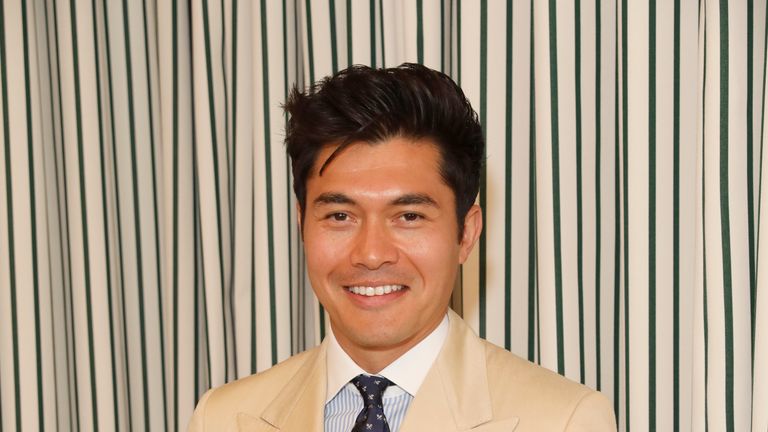 LONDON, ENGLAND - JULY 14: Henry Golding in Ralph Lauren Purple Label attends the Polo Ralph Lauren suite during the Wimbledon Tennis Championship Men's Final at All England Lawn Tennis and Croquet Club on July 14, 2019 in London, England. (Photo by Darren Gerrish/WireImage)