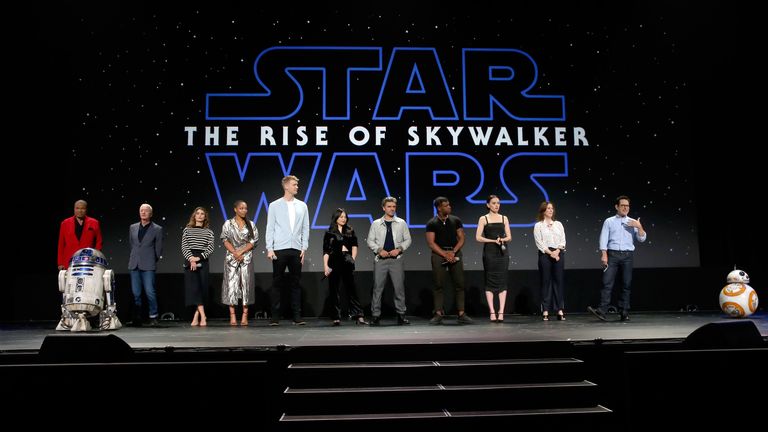 ANAHEIM, CALIFORNIA - AUGUST 24: (L-R) Billy Dee Williams, Anthony Daniels, Keri Russell, Naomi Ackie, Joonas Suotamo, Kelly Marie Tran, Oscar Isaac, John Boyega, Daisy Ridley, Producer Kathleen Kennedy, and Director/producer/writer J.J. Abrams of &#39;Star Wars: The Rise of Skywalker&#39; took part today in the Walt Disney Studios presentation at Disney’s D23 EXPO 2019 in Anaheim, Calif.  &#39;Star Wars: The Rise of Skywalker&#39; will be released in U.S. theaters on December 20, 2019. (Photo by Jesse Grant/Getty Images for Disney)