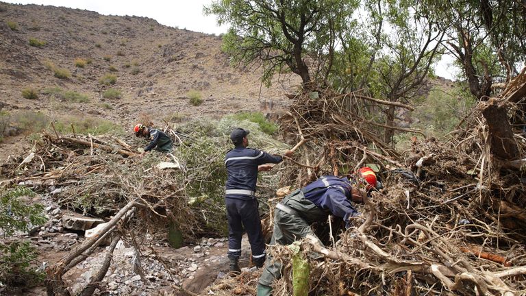 Members of the Moroccan civil defence search for victims at the scene of flooding when a river burst its banks and flooded a village football pitch as a game was being played, in Morocco's southern village of Tizert in the Taroudant region on August 29, 2019. - At least seven people were killed on August 28 when a river burst its banks and flooded a village football pitch where a game was being played in south Morocco, local authorities said. (Photo by - / AFP)        (Photo credit should read -/AFP/Getty Images)