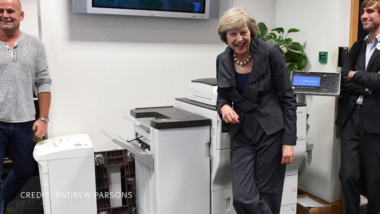 Theresa May having a laugh. Pic: Andrew Parsons