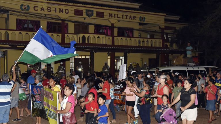 Residents protest demanding the Bolivian government to declare natural disaster and the entrance of international aid due to wildfires in the region, outside the building where the Bolivian environmental cabinet is meeting in Robore, Santa Cruz, Bolivia, on August 25, 2019