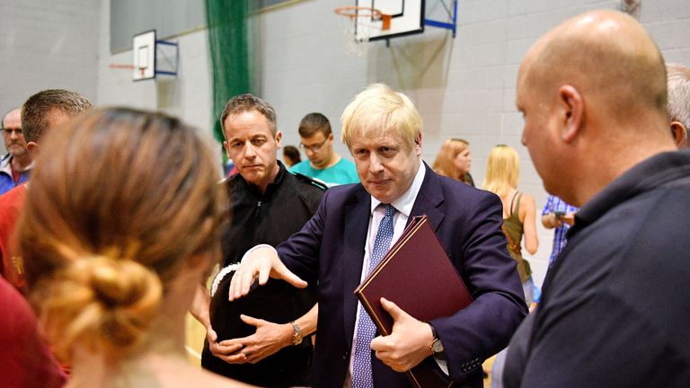 Boris Johnson meeting local residents and rescue crews near Whaley Bridge