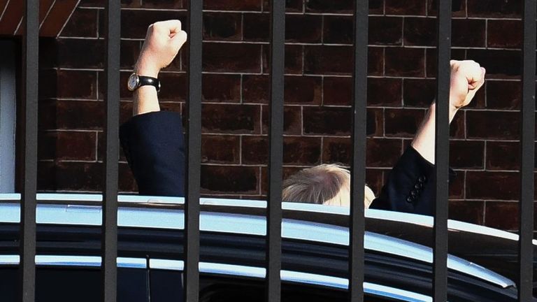Boris Johnson raises two fists on his return to Downing Street Pic: Twitter/@PoliticalPics