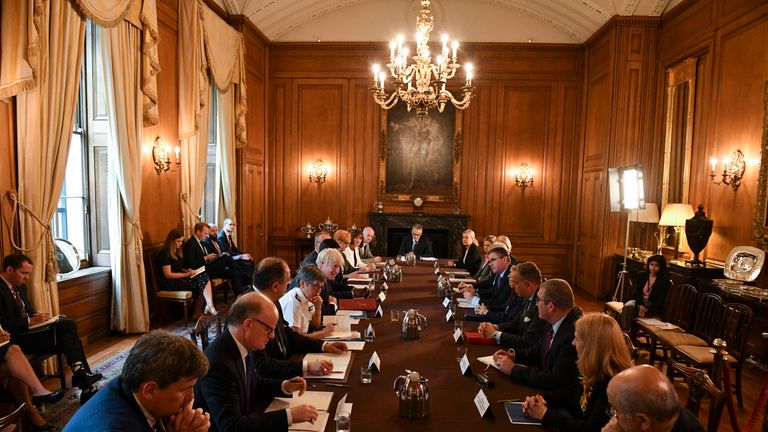 Prime Minister Boris Johnson (5th left) in Downing Street, London, during a roundtable on crime