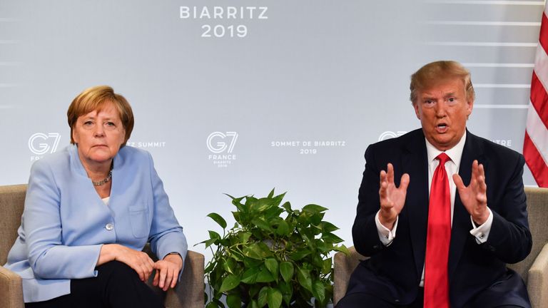 German Chancellor Angela Merkel (L) and US President Donald Trump speak during a bilateral meeting in Biarritz, south-west France on August 26, 2019, on the third day of the annual G7 Summit. (Photo by Nicholas Kamm / AFP)        (Photo credit should read NICHOLAS KAMM/AFP/Getty Images)