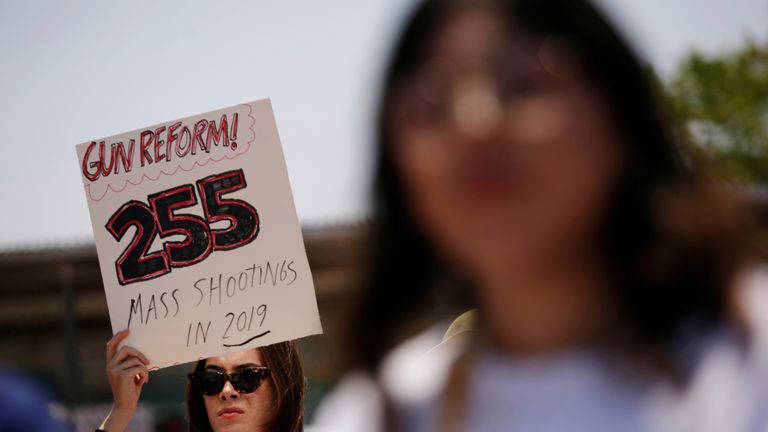 A protester holding a placard in El Paso