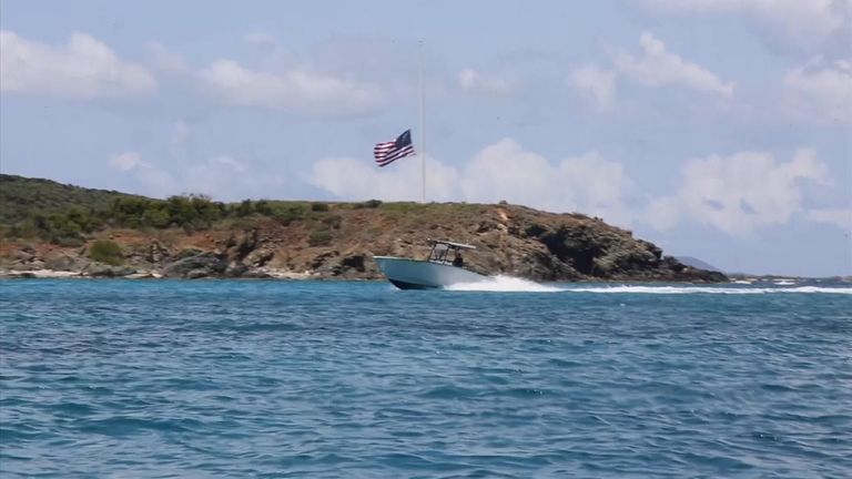 A flag at half mast on the island