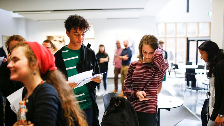 Sixth form students react as they receive their A-Level results