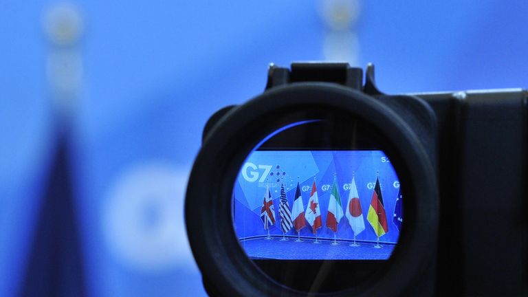 Flags are seen in a camera screen at the G7 summit at the European Council headquarters on June 5, 2014 in Brussels.  AFP PHOTO / GEORGES GOBET        (Photo credit should read GEORGES GOBET/AFP/Getty Images)
