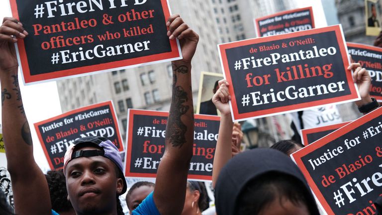 People participate in a protest to mark the five year anniversary of the death of Eric Garner during a confrontation with a police officer in the borough of Staten Island on July 17, 2019 in New York City