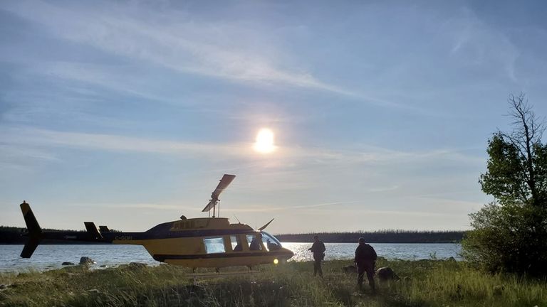 Police search for the two suspects in the rugged terrain around Gillam. Pic taken on 28 July