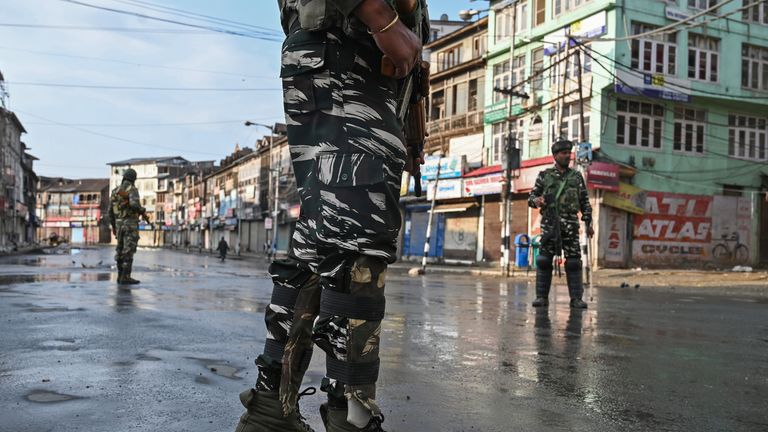 Soldiers patrol the streets of Srinagar, the largest city in Indian-administered Kashmir