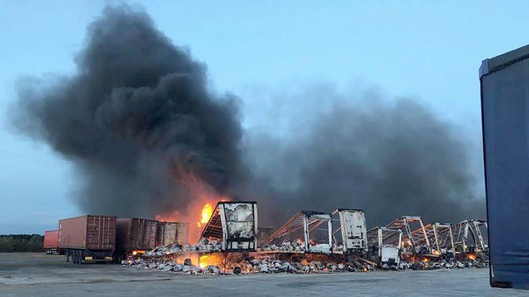 A fire tore through lorry trailers at a washing machine factory in Peterborough