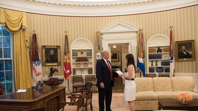 Donald Trump and Madeleine Westerhout. Pic: Myles Cullen/White House