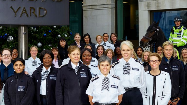 Khafi Kareem pictured behind Cressida Dick as the Met celebrated 100 years of female officers