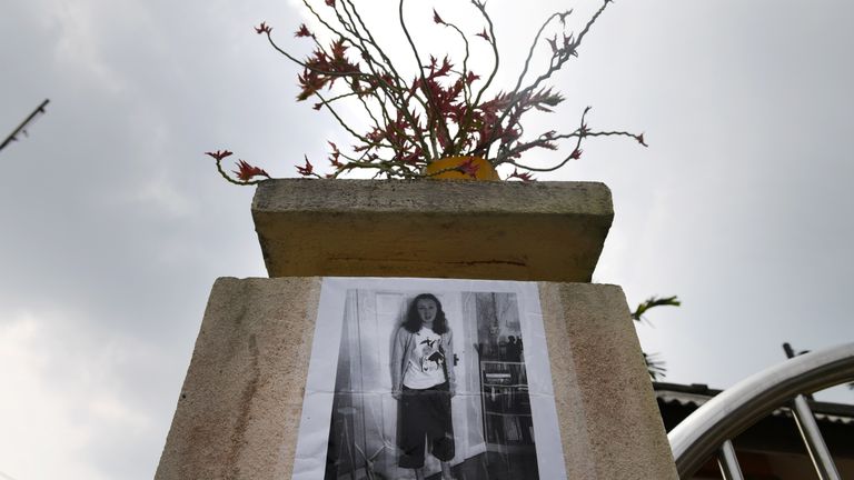 Nora's poster showing outside a school in Seremban
